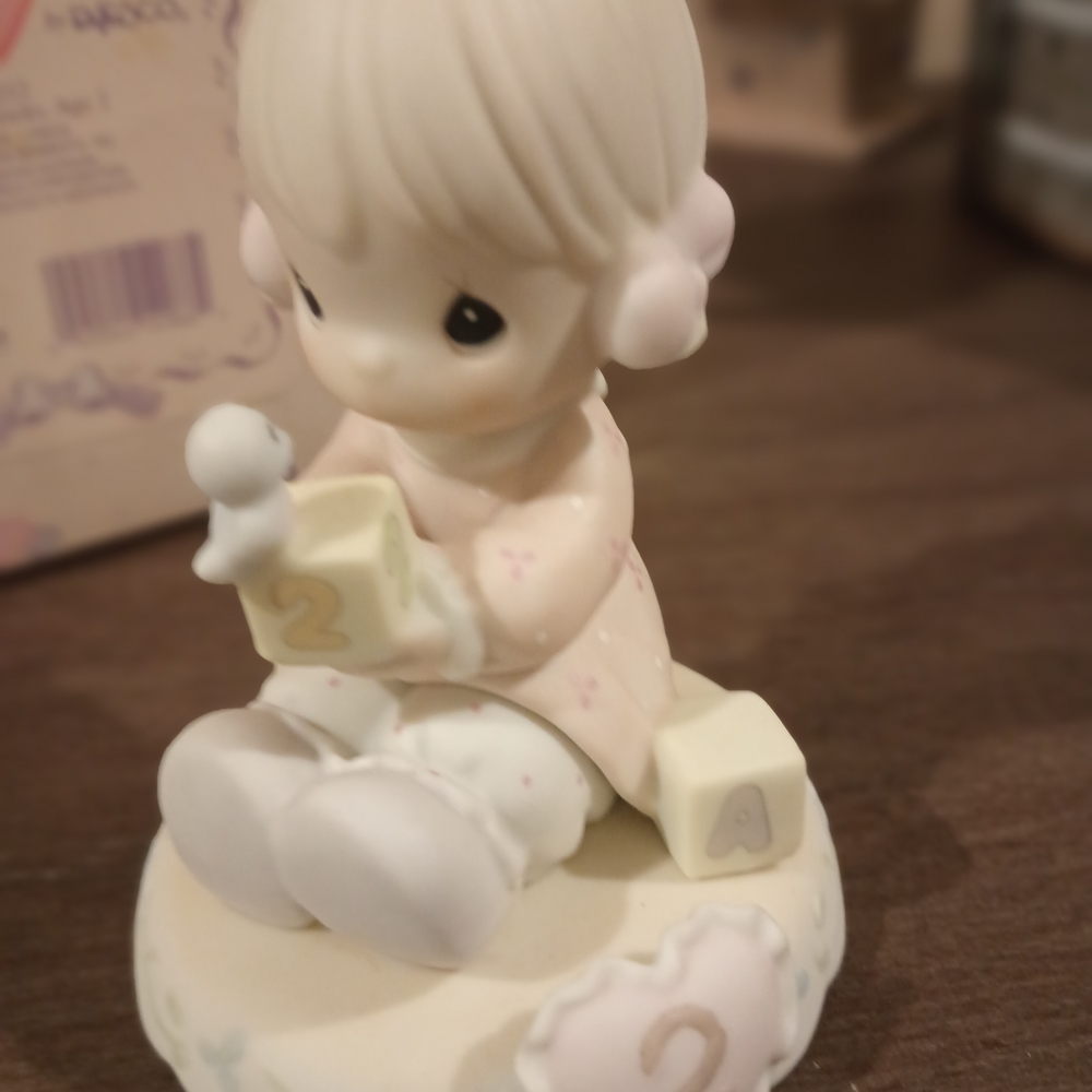 Precious Moments Pink and White Child Figurine